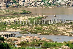 Stone Bridge Prints: Abandoned stone bridge over the Tungabhadra River at Anegundi in Hampi