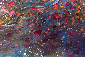 Abstract background, various pigments and dyes create a rich tex