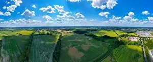 Arable Prints: Abstract geometric shapes of agricultural parcels of different crops in yellow and green colors