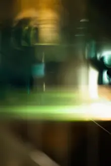 Blurred Motion Prints: Abstract light trails against black background