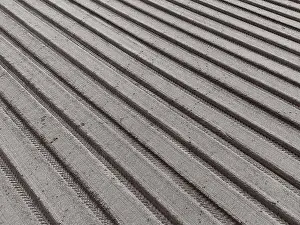 Sowing Prints: Abstract view from a drone showing the recently ploughed arable field