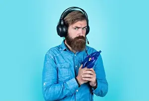 Unshaven Prints: action game. just have fun. unshaven guy play computer games