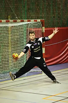 Ball Sport Prints: Action photo save from a handball game showing the goalie in IFK Nyköping