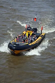 London Capital Prints: An adventure experience boat on the River Thames near Waterloo Bridge