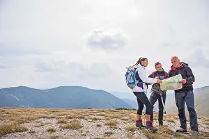 Backpacks Prints: adventure, travel, tourism, hike and people concept - group of smiling friends with backpacks and map outdoors