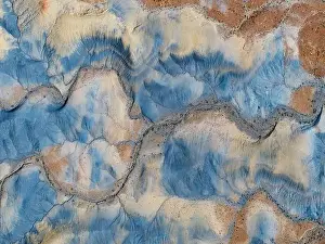 Rock Formations Prints: Aerial abstract view taken by drone of desert area near to Big Water during a sunny summer day