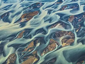 Polar Regions Prints: Aerial abstract view taken by drone of the textured river along the Icelandic southern coast