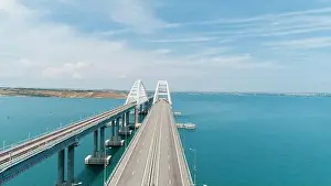 Natal Prints: Aerial breathtaking view of the turquoise sea and a long white bridge with arcuate shape