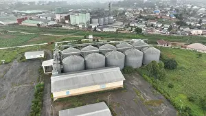 Nigeria Prints: An aerial city view of Grand Cereals in Jos, Nigeria from high above