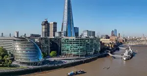 Business Tower Prints: Aerial cityscape of the Thames river on a sunny day with the City Hall