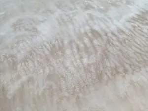 Overland Prints: Aerial close up of the surface of the huge salt flats Salinas Grandes de Jujuy in northern Argentina while traveling