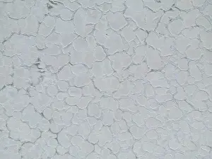Crystallization Prints: Aerial close up of the surface of the huge salt flats Salinas Grandes de Jujuy in northern Argentina while traveling