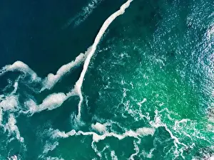 Greenish Prints: Aerial close up of the turquoise sea at the coast of the National Park Pan de Azúcar in the Atacama desert in Chile