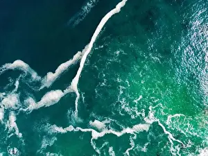Greenish Prints: Aerial close up of the turquoise sea at the coast of the National Park Pan de Azúcar in the Atacama desert in Chile