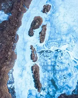 Dull Prints: Aerial drone fly air shot, view on ice lake frozen winter top down road moody mood grey blue