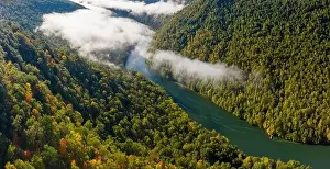 Appalachia Prints: Aerial drone image of the Cheat River flowing through narrow wooded gorge in the autumn towards Cheat Lake near