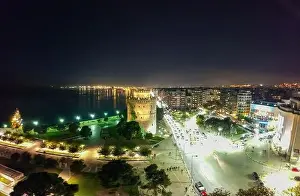 Thessaloniki Prints: Aerial drone night view of illuminated downtown area of famous city of Thessaloniki or Salonica