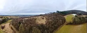 Forest Hill Prints: aerial drone panorama of green hills with a little snow in Lower Austria at the edge of the Vienna Woods near Vienna