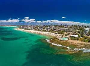 Bribie Prints: Aerial drone panoramic image of ocean waves on a busy Kings beach