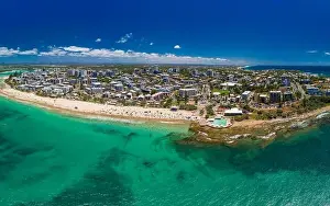 Bribie Prints: Aerial drone panoramic image of ocean waves on a busy Kings beach