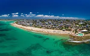 Bribie Prints: Aerial drone panoramic image of ocean waves on a busy Kings beach