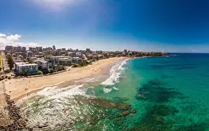 Bribie Prints: Aerial drone panoramic image of ocean waves on a busy Kings beach