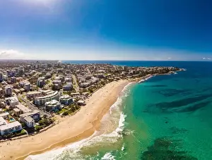 Bribie Prints: Aerial drone panoramic image of ocean waves on a busy Kings beach