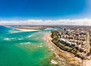Bribie Prints: Aerial drone panoramic image of ocean waves on a busy Kings beach