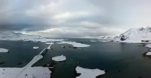 Reine Prints: Aerial drone panoramic view of amazing Lofoten Islands winter scenery with famous Reine fishing village Norway