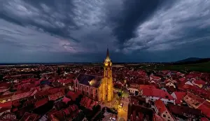 Alsatian Prints: Aerial drone panoramic view of night highlighted village Dambach-la-Ville in Alsace