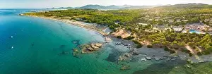 Aerial drone panoramic view of Porto Tramatzu beach and the town, Sardinia, Italy
