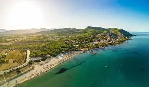 Porto Corallo Prints: Aerial drone panoramic view of Porto Tramatzu beach and the town, Sardinia, Italy