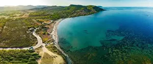 Porto Corallo Prints: Aerial drone panoramic view of Porto Tramatzu beach and the town, Sardinia, Italy