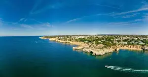 Aerial drone panoramic views of Praia Nova and Praia de Nossa beach, Algarve, Portugal