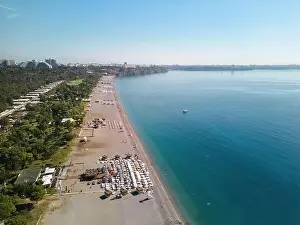 Konyaalti Prints: Aerial drone photo of Antalya Konyaalti beach and cliffs. Selective focus