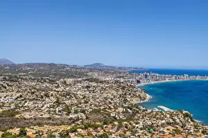 Aerial drone photo of the beautiful coastal town of Calp on Spain's Mediterranean coast showing an aerial drone view of
