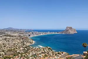 Aerial drone photo of the beautiful coastal town of Calp on Spain's Mediterranean coast showing an aerial drone view of