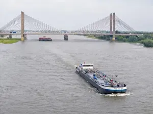 Cargo Ship Prints: Aerial drone photo of a cargo ship on the river Waal in the Netherlands