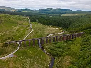 Galloway Prints: Aerial drone photo of an old railway bridge in Galloway Forest National Park in Scotland