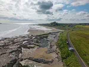 Aerial drone photo that shows the beautiful coastline at Northumberland in England