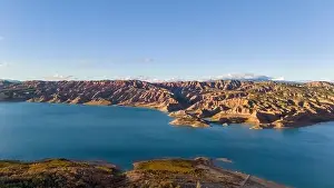 Geopark Prints: This aerial drone photo shows the lake Negratin in the Granada Geopark, Spain