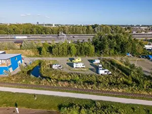 Campsite Prints: This aerial drone photo shows a parking at the Valkenburgse meer