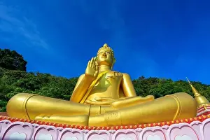 Aerial drone point of view landscape of Wat Khao Rang a buddhist Thai temple on the island of Phuket, Thailand