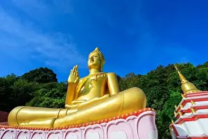 Aerial drone point of view landscape of Wat Khao Rang a buddhist Thai temple on the island of Phuket, Thailand