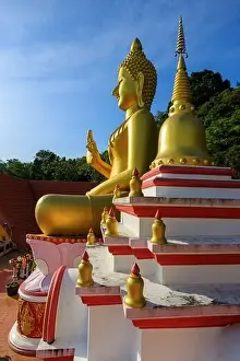 Aerial drone point of view landscape of Wat Khao Rang a buddhist Thai temple on the island of Phuket, Thailand