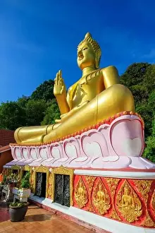 Aerial drone point of view landscape of Wat Khao Rang a buddhist Thai temple on the island of Phuket, Thailand