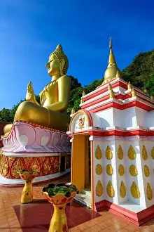 Aerial drone point of view landscape of Wat Khao Rang a buddhist Thai temple on the island of Phuket, Thailand