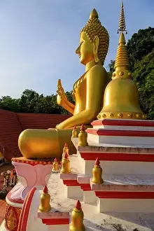 Aerial drone point of view landscape of Wat Khao Rang a buddhist Thai temple on the island of Phuket, Thailand