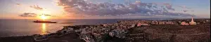 Vacation Village Prints: Aerial drone. Rocky coastline and island at Portopalo di Capo Passero