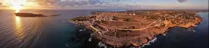 Vacation Village Prints: Aerial drone. Rocky coastline and island at Portopalo di Capo Passero